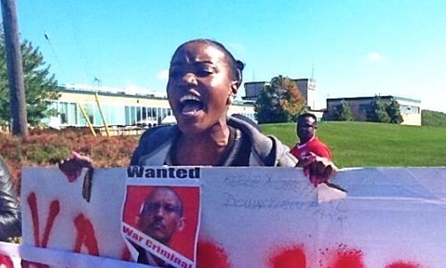 Angry protestor outside Rwandan President Paul Kagame's appearance in Toronto.