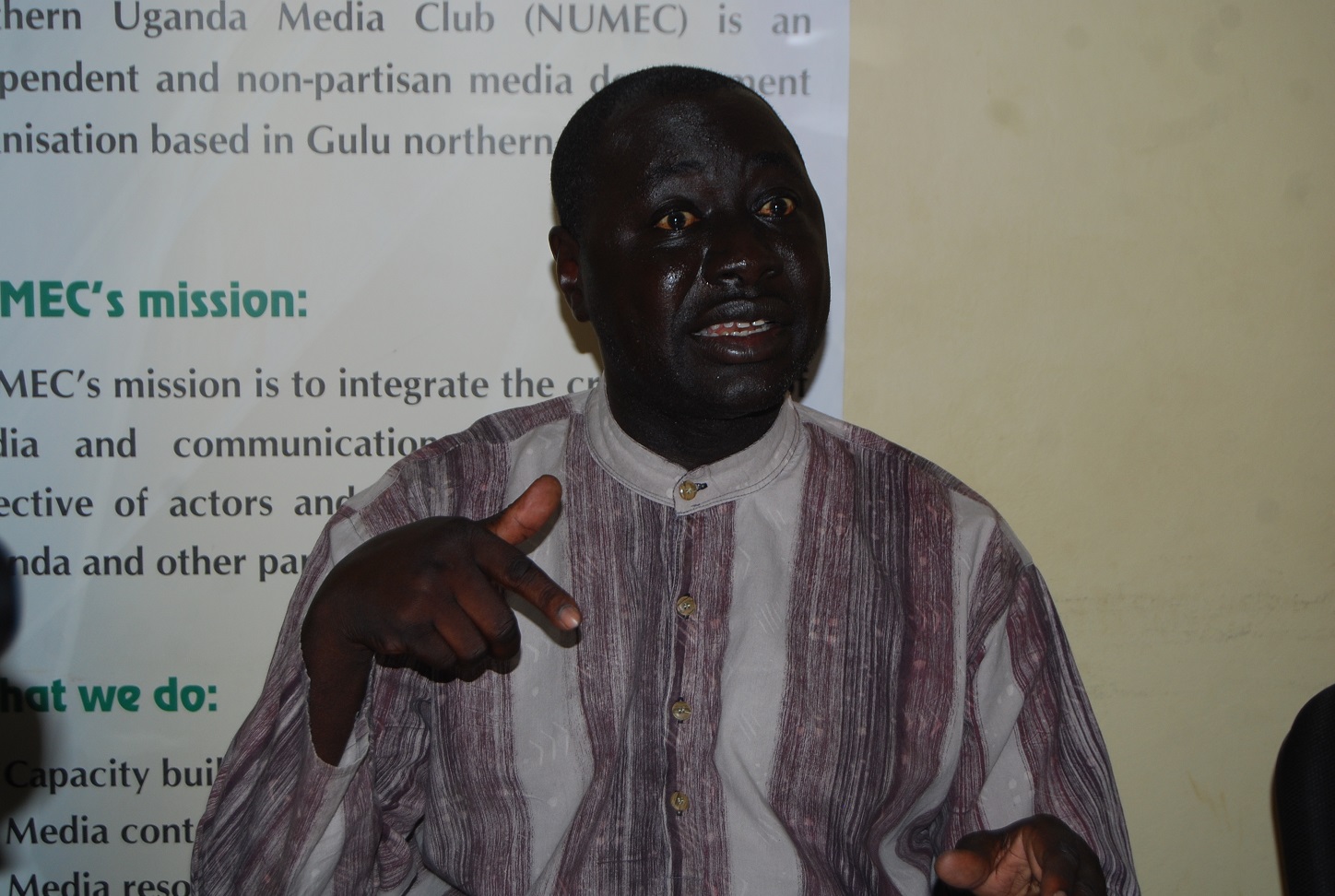 Okumu Reagan addressing the Press at NUMEC Media Centre in Gulu Uganda