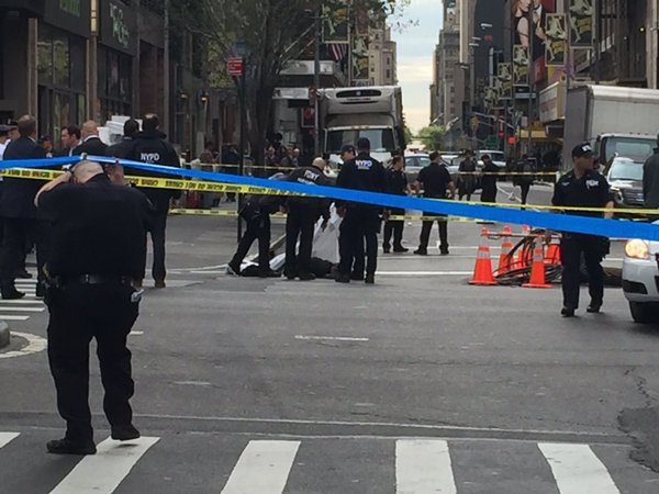 cops shoot man with knife in MIDTOWN