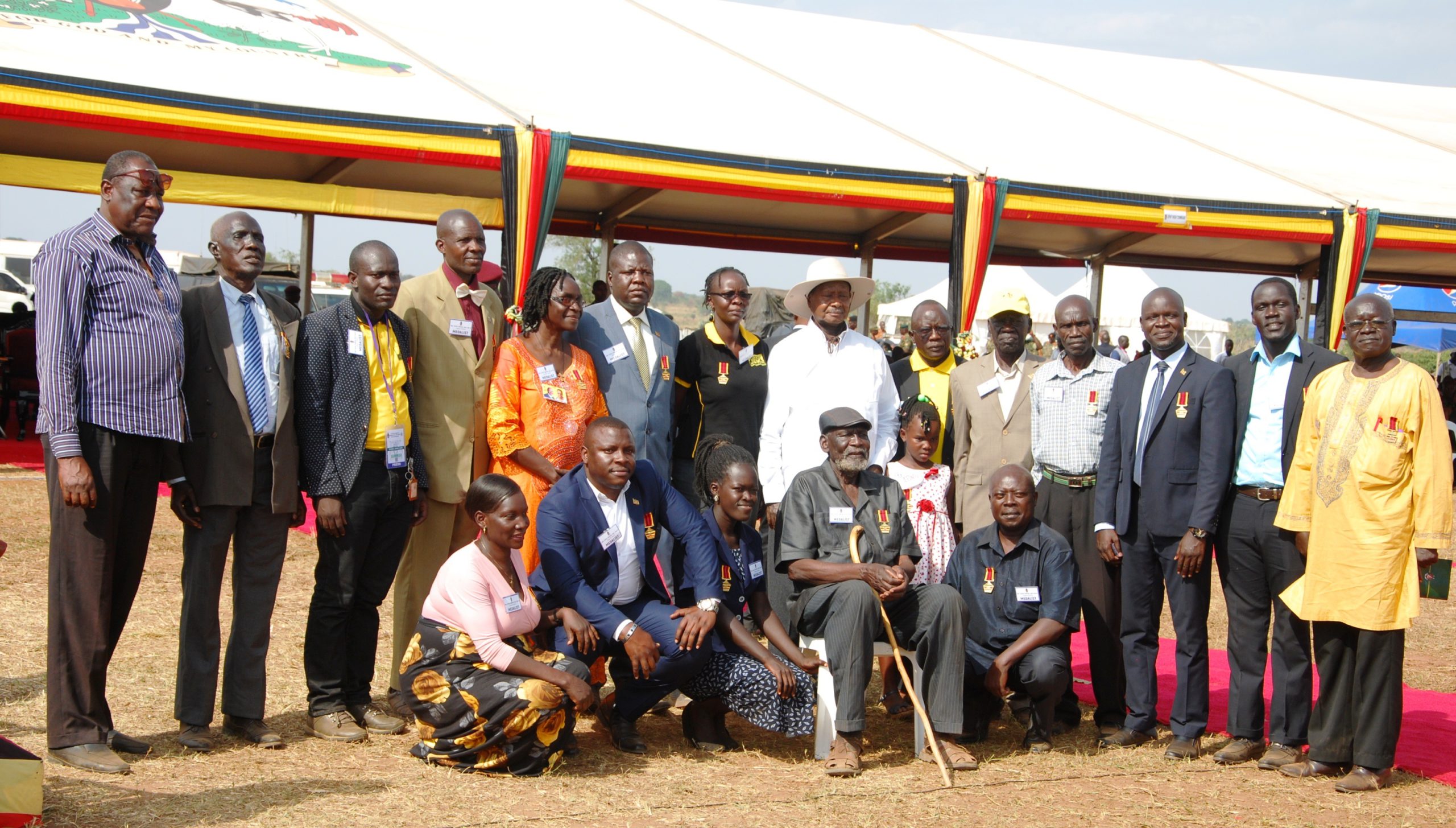 Some medalists pose with General Museveni
