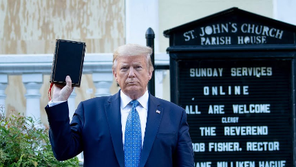 Trump (above) giving a Bible shoutout to his white right-wing "Christian" fundamentalist supporters.