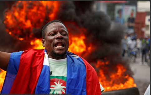 Haitian police on Wednesday clashed with rock-hurling protesters in the capital Port-Au-Prince amid street demonstrations agains