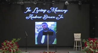 Rev. Al Sharpton, delivering the eulogy at Brown's funeral