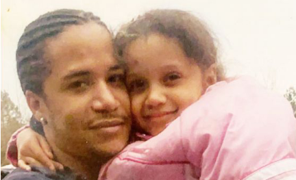 Black Dominican Kelvin Silva, shown above with his daughter, who is incarcerated in Georgia and awaiting deportation.