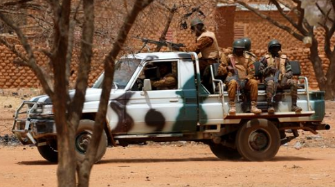 Suspected jihadists killed 14 soldiers in an attack in northern Burkina Faso on Monday,