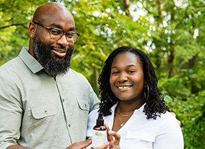 Lydia Gibson (above with husband) is the founder of Eva Jenae Naturals.