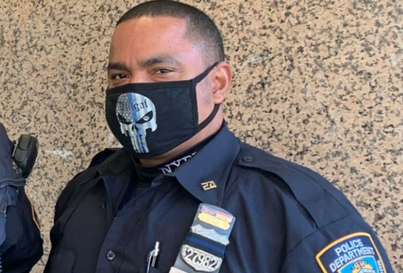 pro-Trump NYPD cop shown wearing mask with Marvel Comics character The Punisher