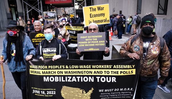 Hundreds of poor and low-wealth people marched through Wall Street,